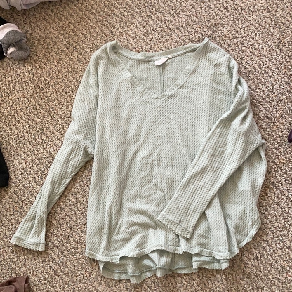light blue sweater